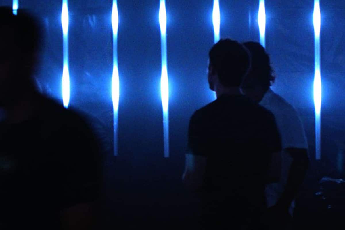 crowd in a dark room