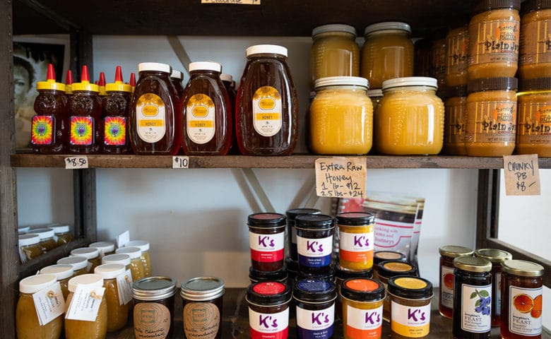 jars of honey and nut butter on store shelves
