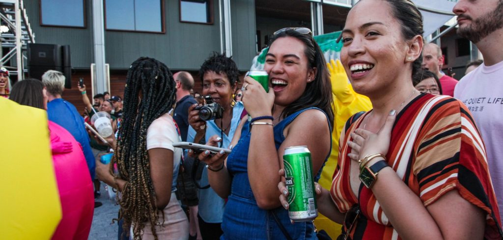 guests enjoying heineken beer cans at the heineken riverdeck