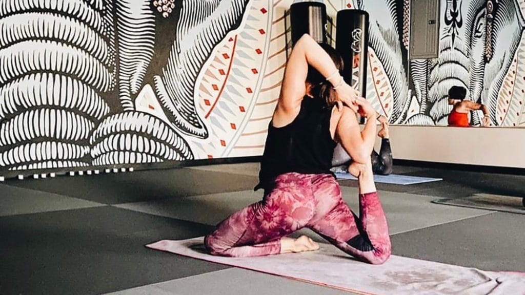 woman practicing yoga