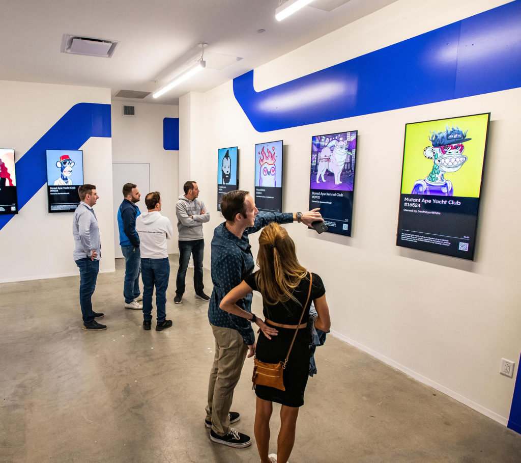 people viewing art at 0x.17 Gallery