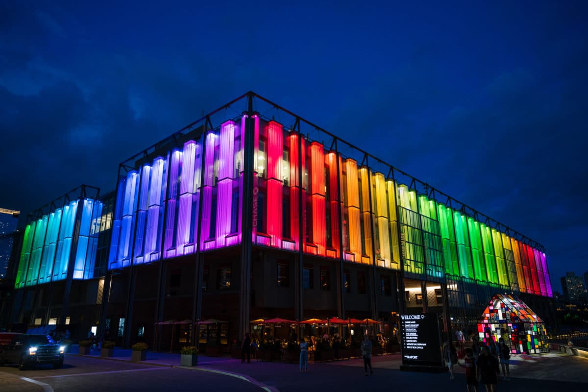 Pier 17 lit up with rainbow colors