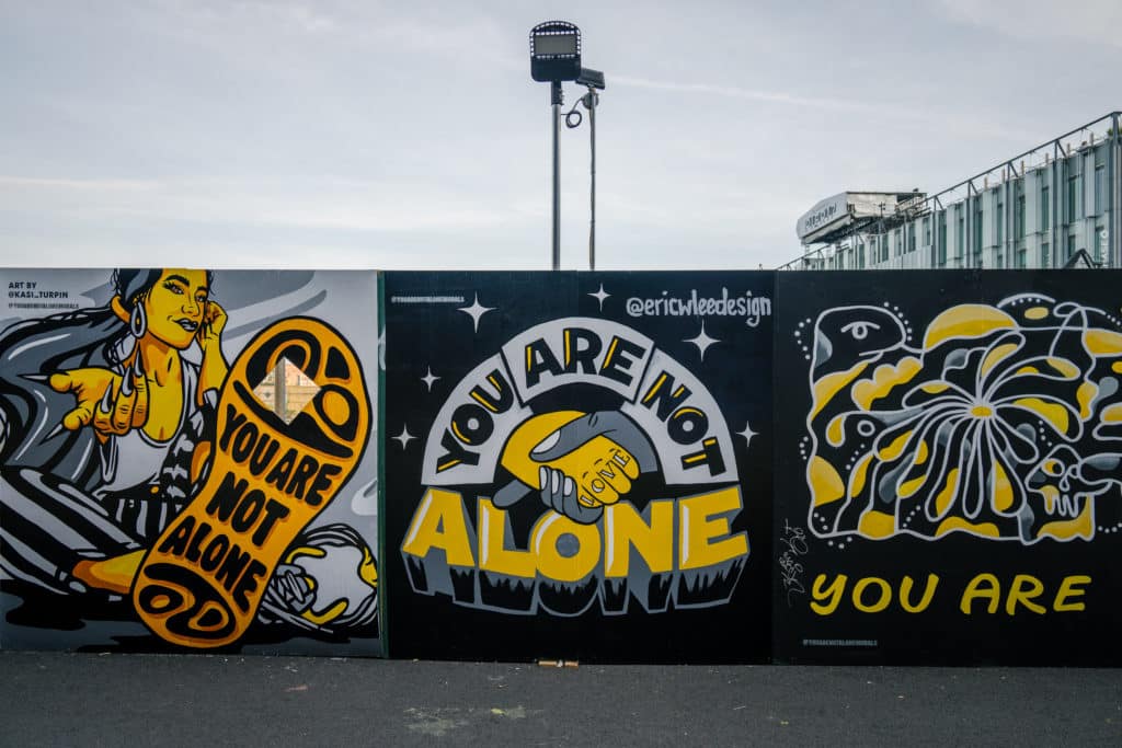 "You Are Not Alone" graffiti mural at the Seaport