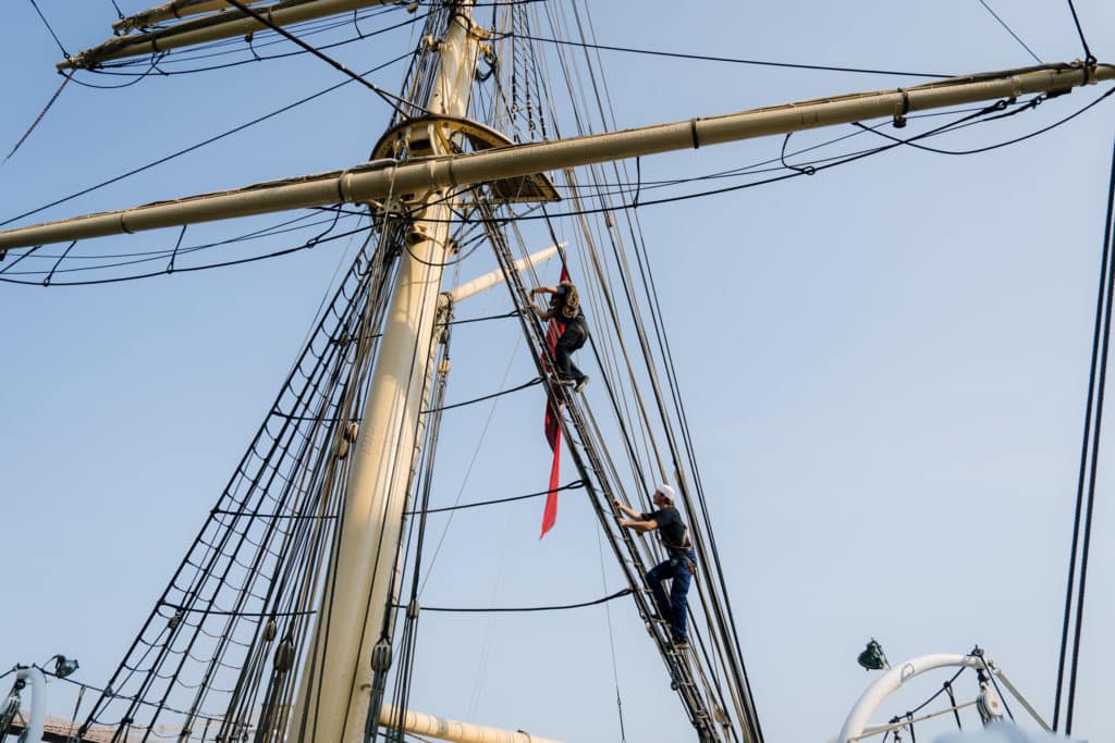 Danmark cadets climbing up the sail ladder