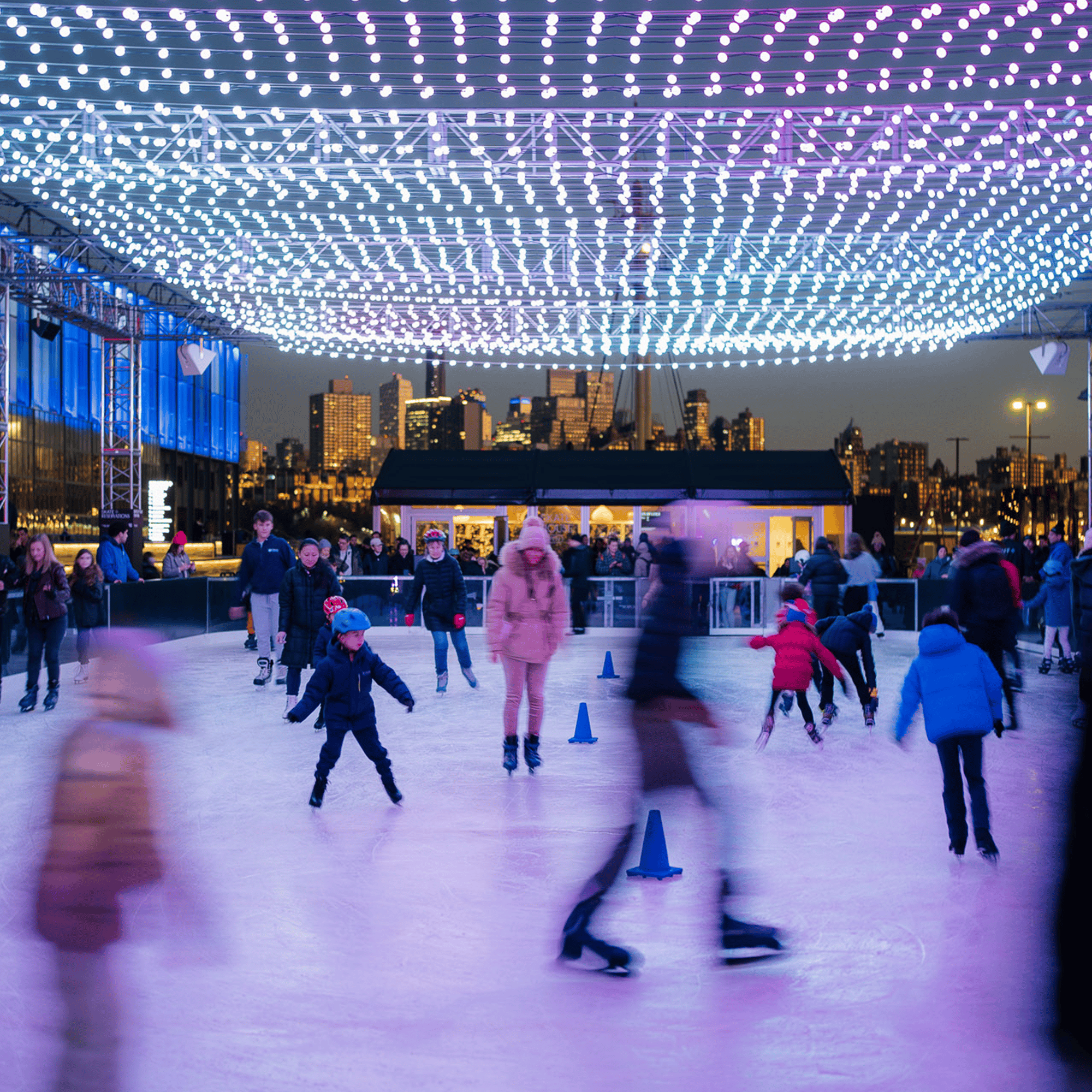 people skating at the new ice rink in the seaport