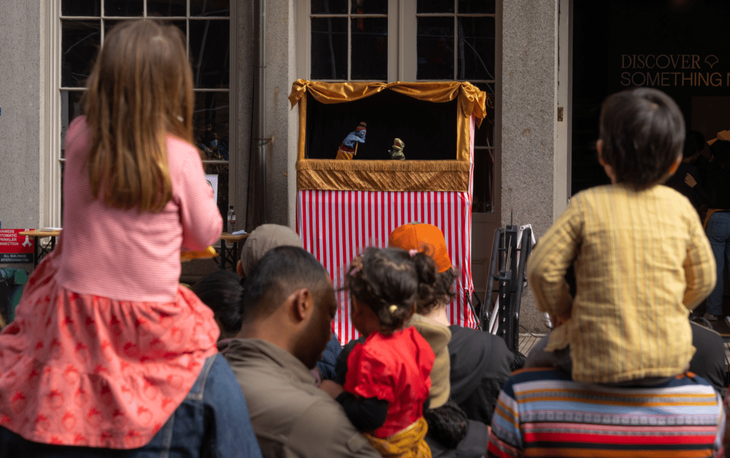 puppet show at the Seaport during Holi Celebration
