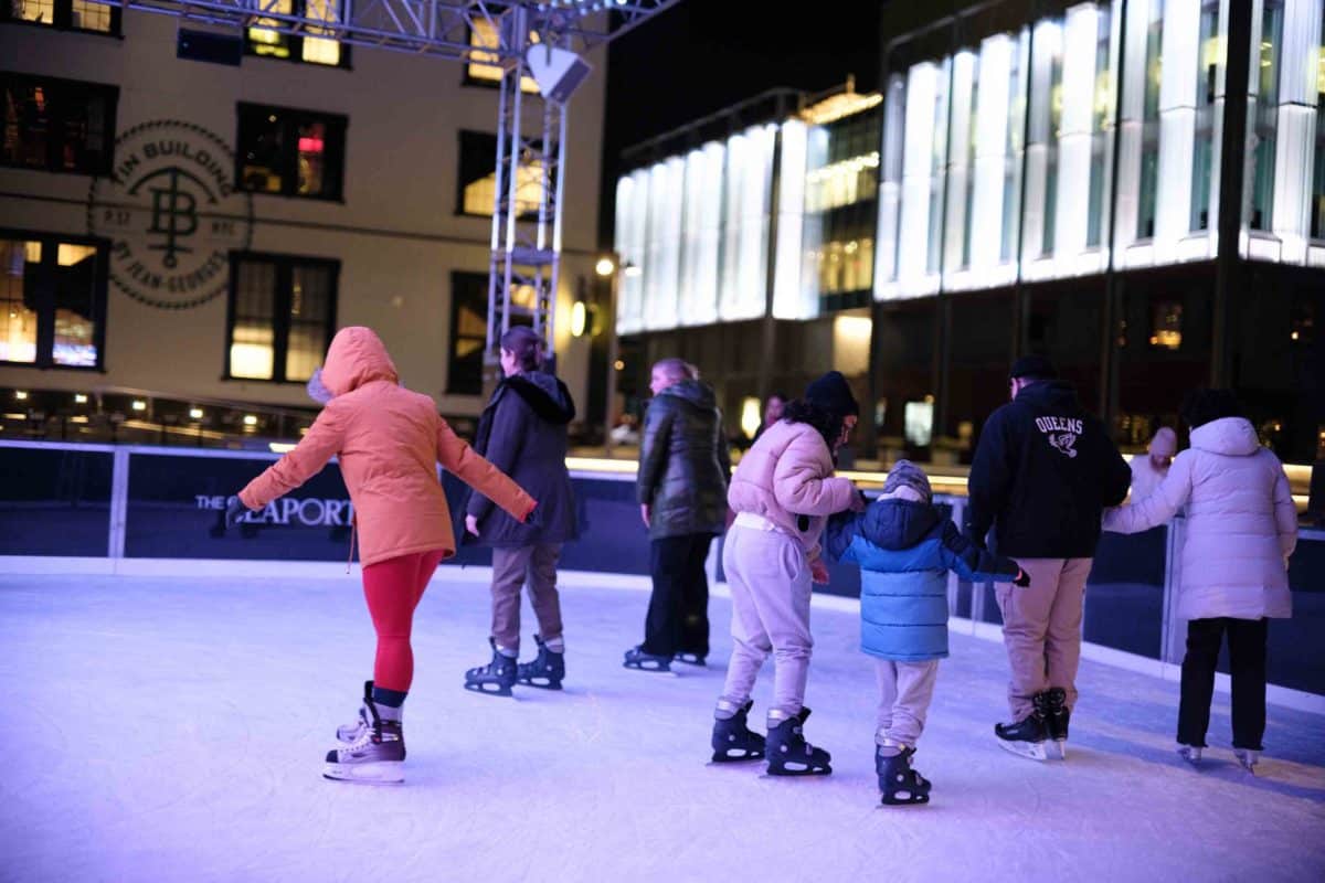 people skating at the Ice Rink at the Seaport