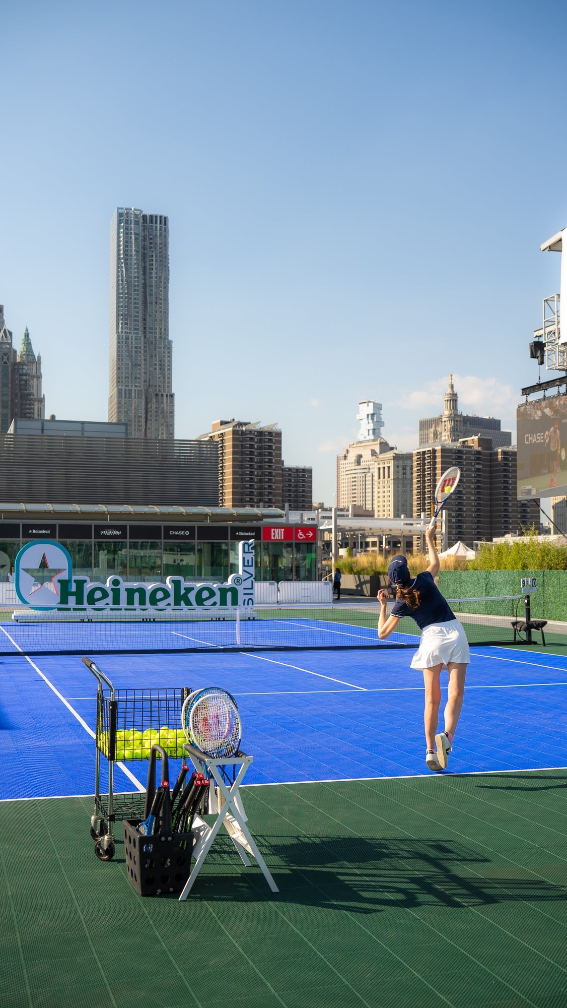 Game. Set. Match. Tennis with a view. Our pop-up tennis court is now open on The Rooftop at Pier 17. Swing by for skyline views, play and refreshments ↴ 🗓️ Now – Sept. 9  The Rooftop at Pier 17 Details ➤ link in bio Presented by Chase Sapphire, Heineken, and Grey Goose. #TheSeaport