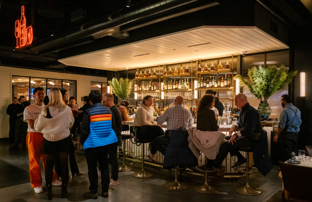 people drinking at Bar at Tin Building