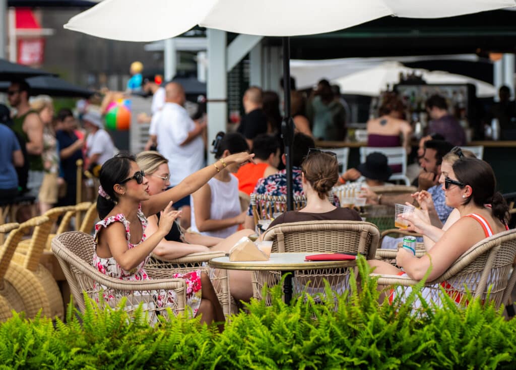 people having cocktails at the Outdoor Bar at Tin Building