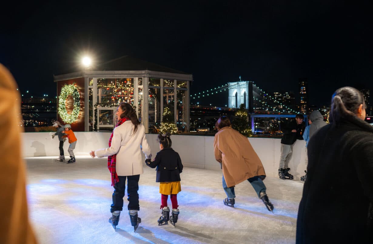 people ice skating at the Rooftop at Pier 17