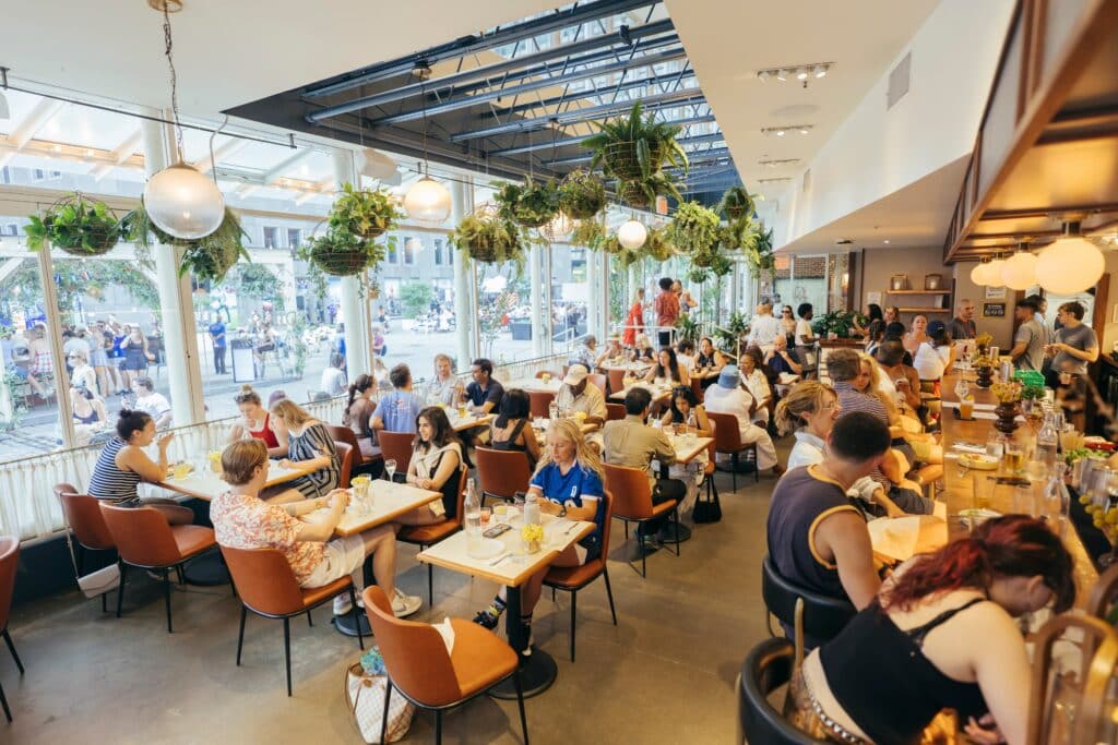 the interior and main dining room at sadie's at the seaport