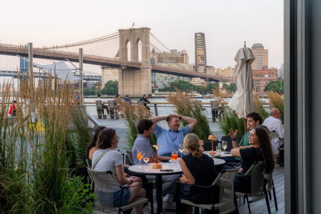 the outdoor patio at the fulton overlooking the brooklyn bridge