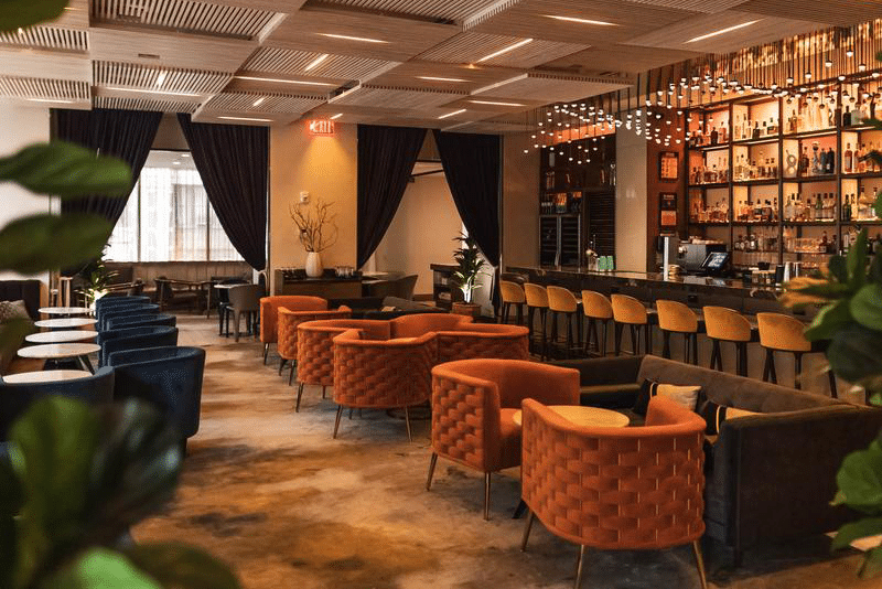 the bar and lounge at lithos, the modern mediterranean restaurant at the ac hotel in the seaport